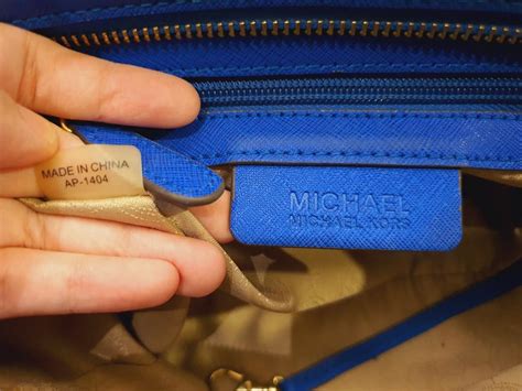 how to know if my michael kors bag is real|Michael Kors serial number checker.